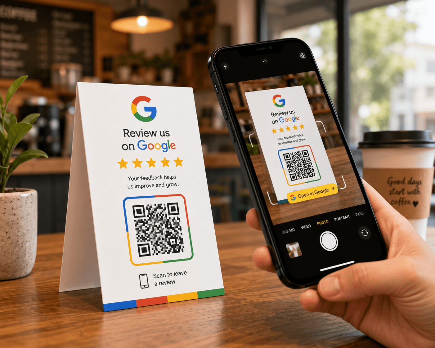 Google review QR code on a restaurant table card being scanned by a smartphone